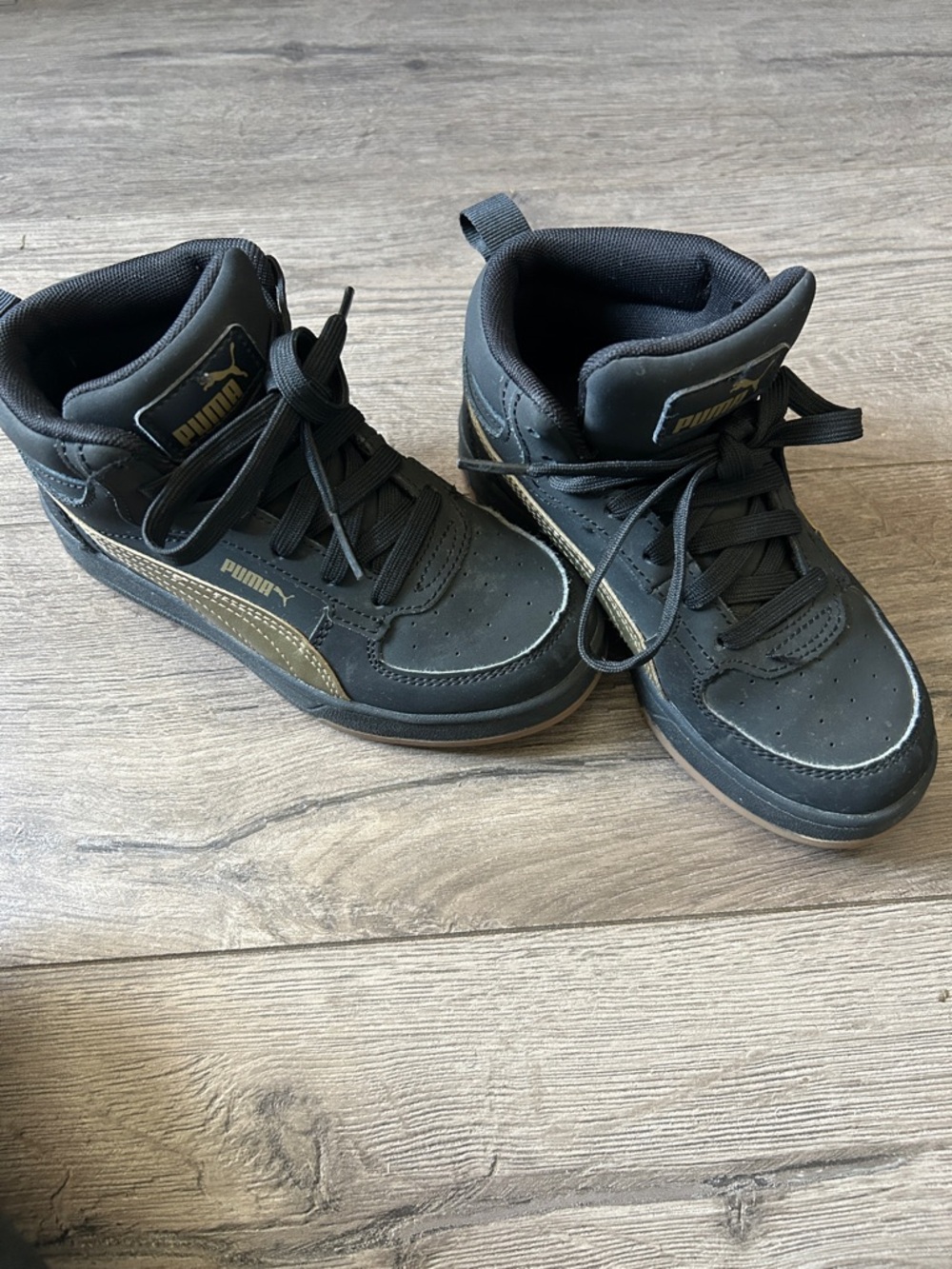 Puma Kids Black Sneakers with Gold Accent size 13